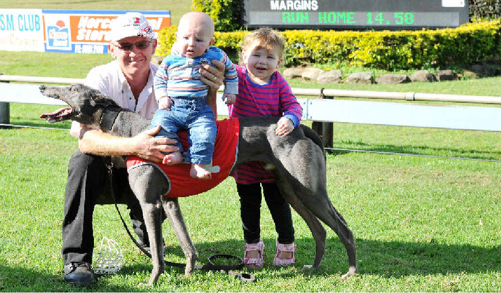 Owner-trainer Robbie Andrews celebrates with his grandchildren Chloe and Jack Oaten after his charge Beaver’s Joy (inset below) claimed victory over 411m in the Casino RSM Club Stakes. Owner-trainer Robbie Andrews celebrates with his grandchildren Chloe and Jack Oaten after his charge Beaver’s Joy (inset below) claimed victory over 411m in the Casino RSM Club Stakes.
